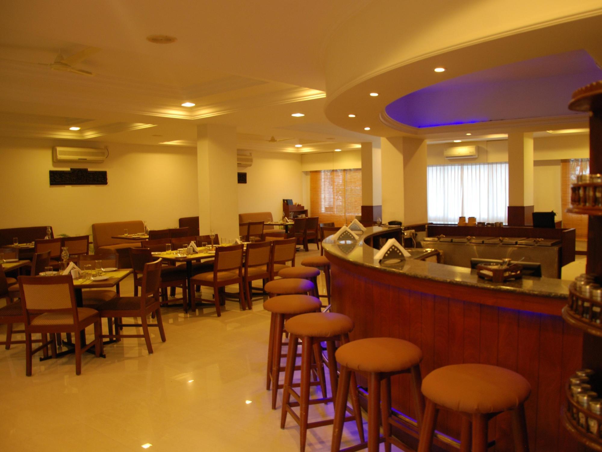 The Pearl Hotel Hassan Buitenkant foto