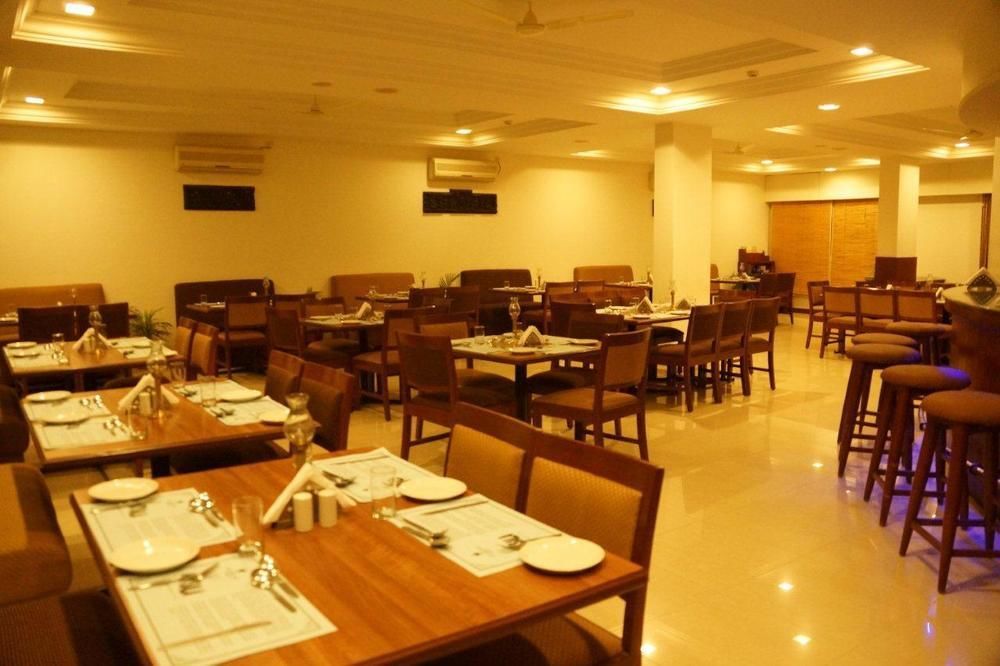 The Pearl Hotel Hassan Buitenkant foto