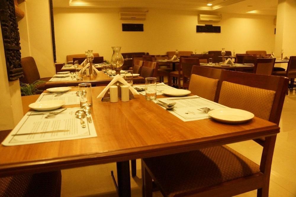 The Pearl Hotel Hassan Buitenkant foto