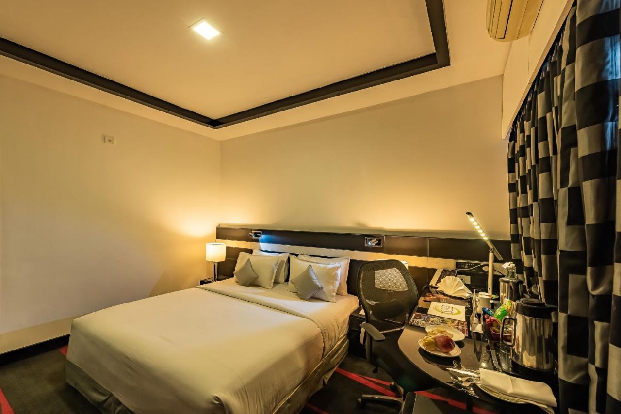 The Pearl Hotel Hassan Buitenkant foto