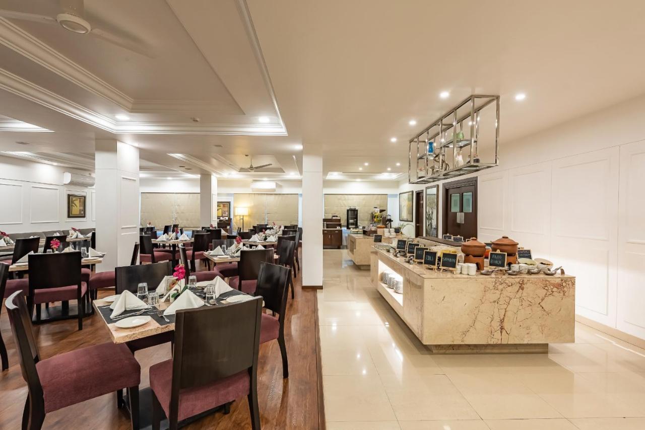 The Pearl Hotel Hassan Buitenkant foto