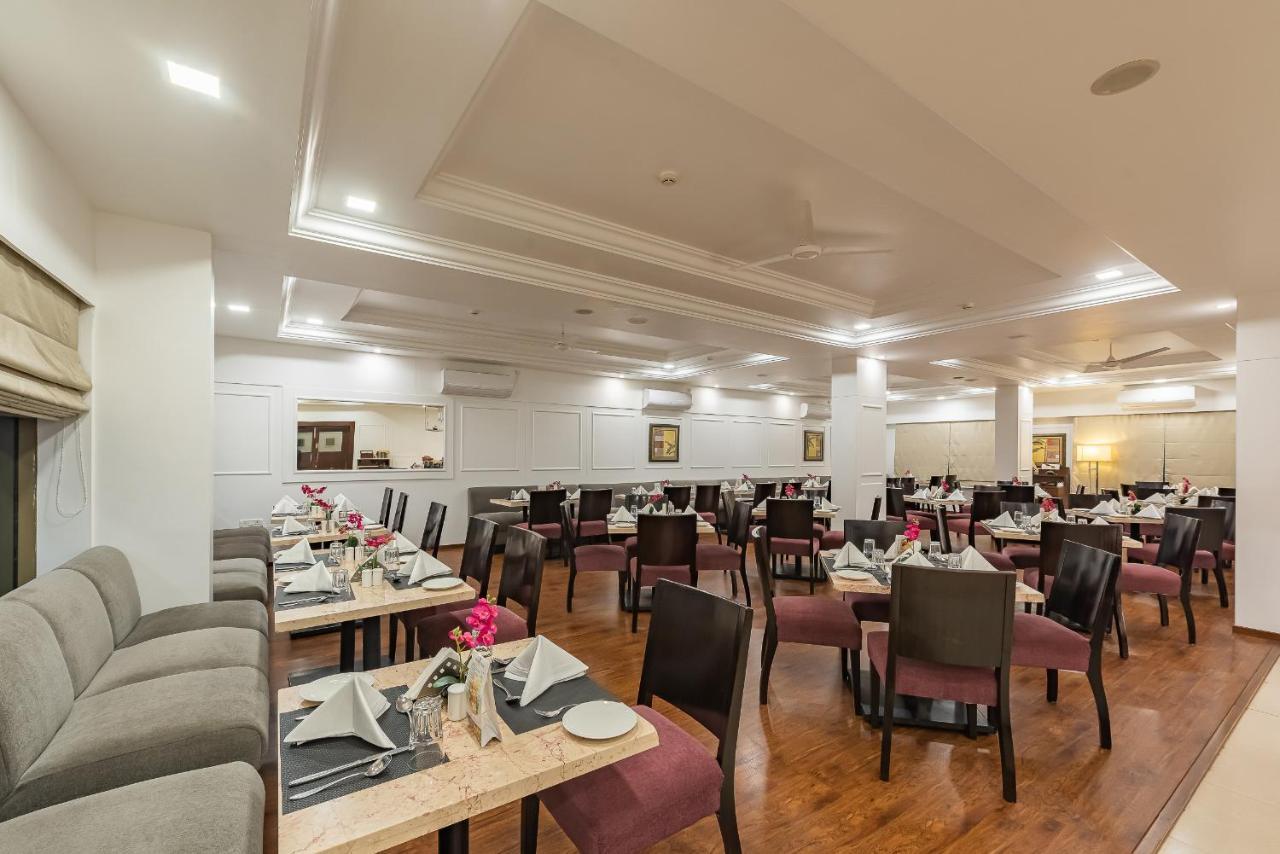 The Pearl Hotel Hassan Buitenkant foto
