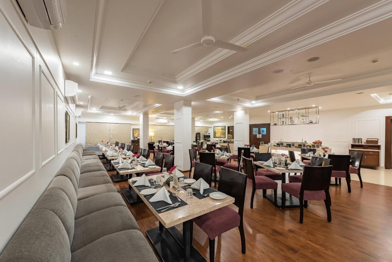 The Pearl Hotel Hassan Buitenkant foto